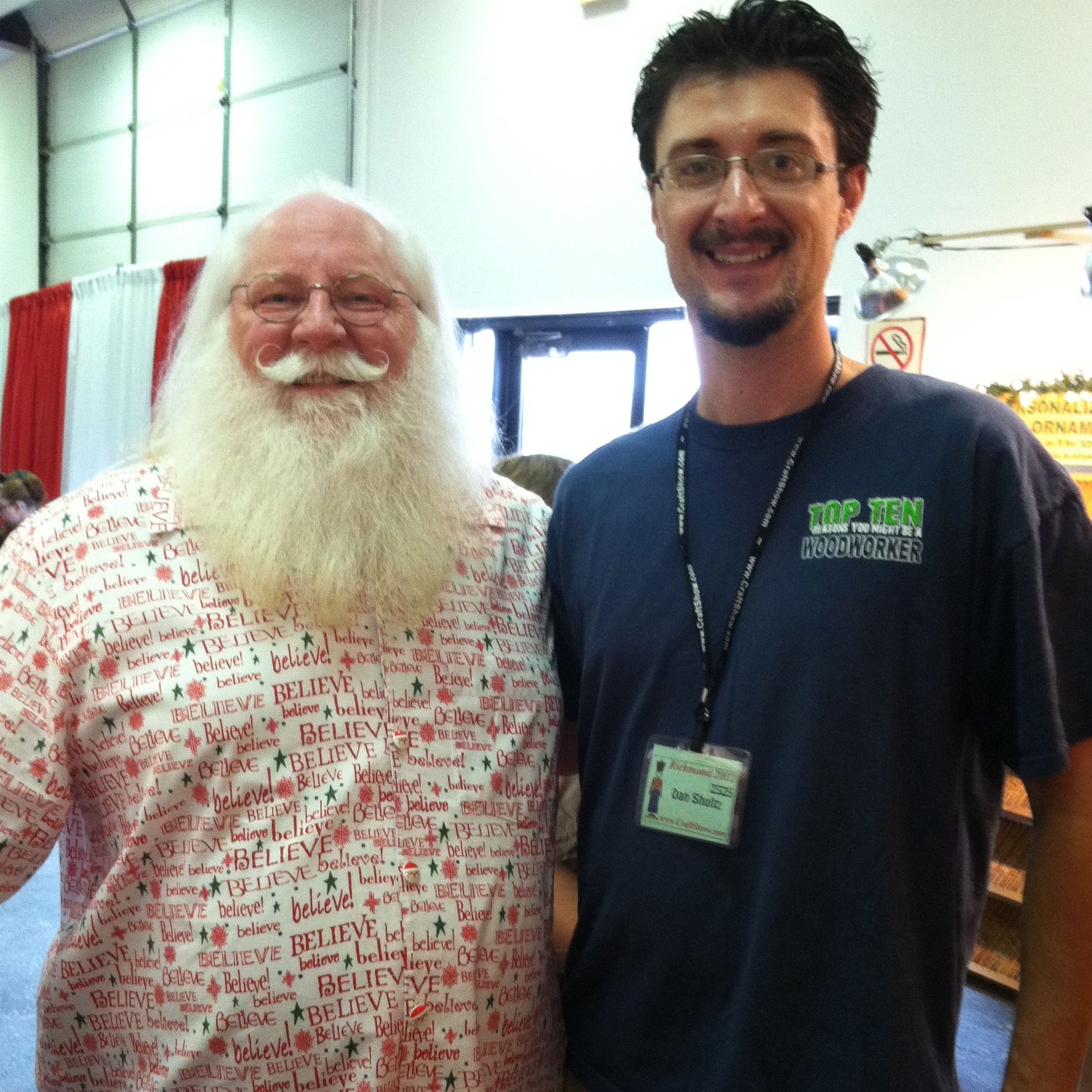 Santa often makes appearances. Here he is with Dan.