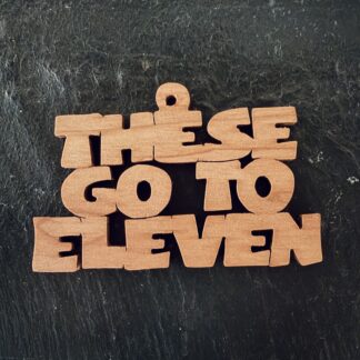 these go to eleven Scrolling It Out Ornaments